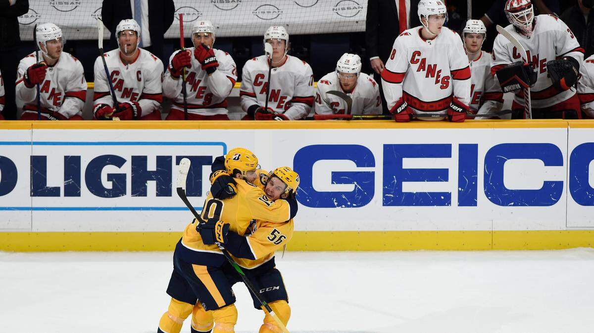 Nashville Predators left wing Erik Haula (56) celebrates with center Calle Jarnkrok (19) after scoring a goal against the Carolina Hurricanes on Saturday.