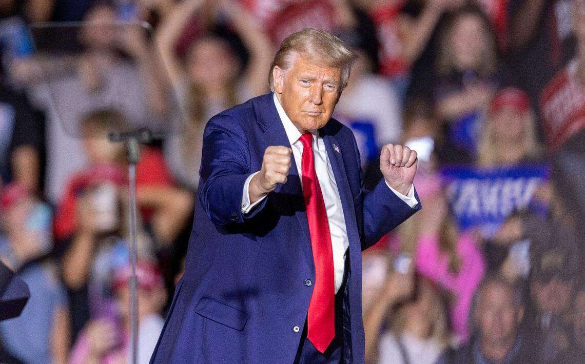 Former President Donald Trump dances while leaving the stage following a rally speech at Minges Coliseum in Greenville on Monday, Oct. 21, 2024. With two weeks until Election Day, Trump went on a three-city tour, in which Trump will also see the destruction caused by Hurricane Helene in Asheville and speak at a faith conference in Concord.