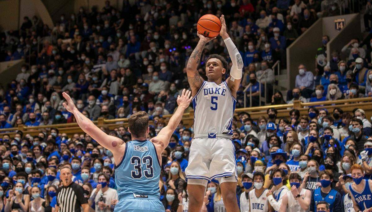 Duke’s Paolo Banchero (5) puts up a shot over Citadel’s Hayden Brown (33) during the first half on Monday, November 22, 2021 at Cameron Indoor Stadium in Durham, N.C. Banchero scored 13 points in the first half.
