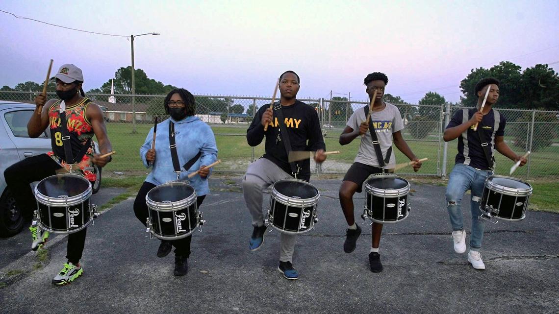 Members of the Drummers World Drumline & Performing Arts School rehearse days before an upcoming performance on August 12, 2021 in Goldsboro, N.C.