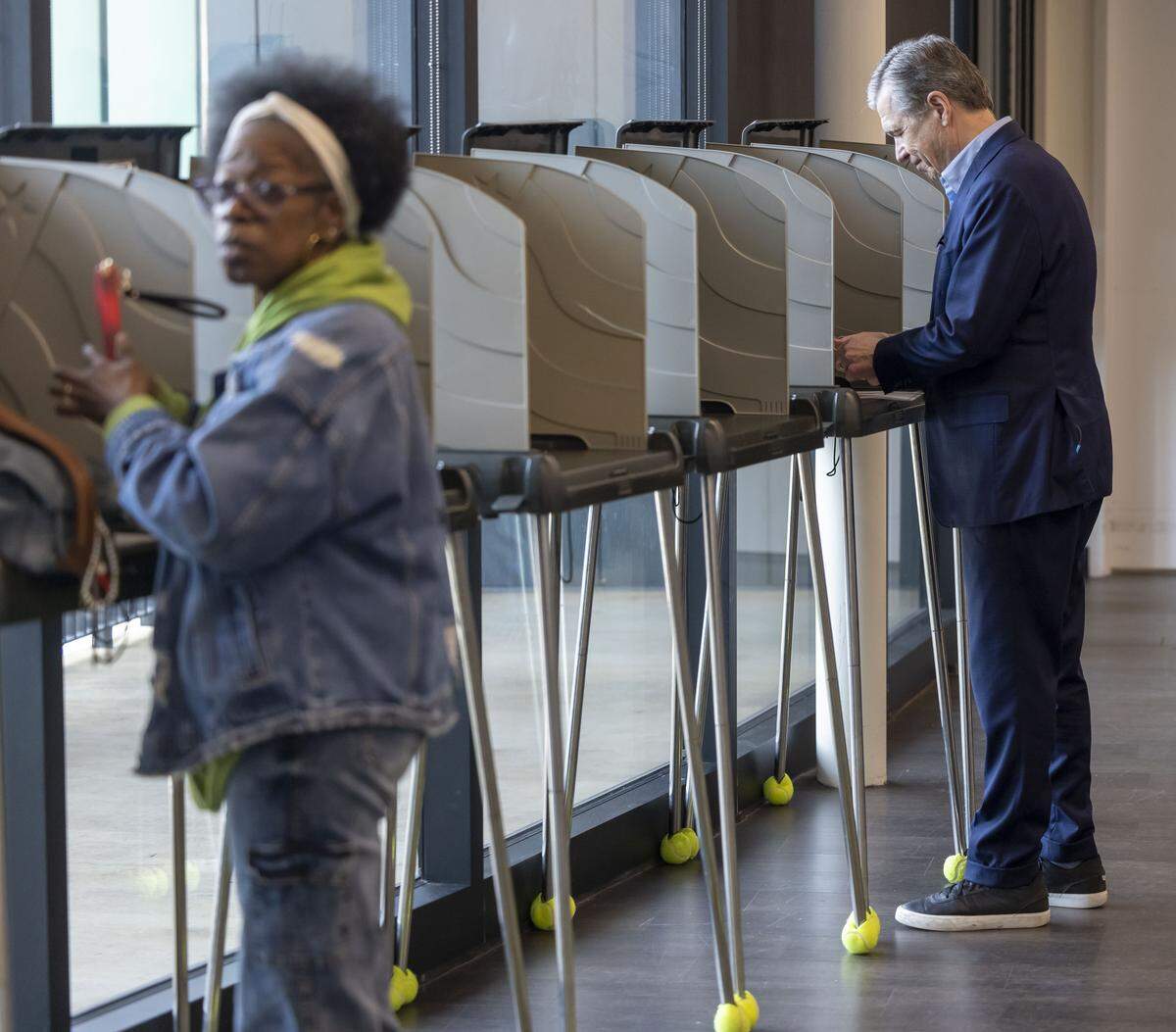 Former NC governor and U.S. Senate candidate Roy Cooper casts his ballot at the Chavis Community Center on the first day of early voting in the North Carolina primary, on Thursday, Feb. 12, 2026, in Raleigh, N.C. 