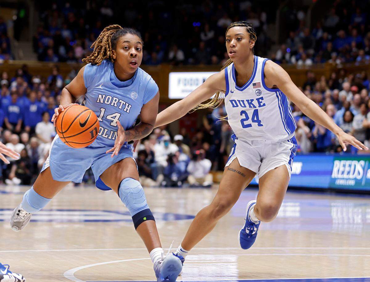 North Carolina’s Kayla McPherson pushes the ball past Duke’s Reigan Richardson during the second half of North Carolina’s 45-41 win over Duke on Sunday, Feb. 26, 2023, at Cameron Indoor Stadium in Durham, N.C.