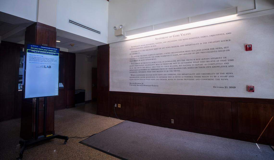Walter Hussman Jr.’s “statement of core values” can be seen on the wall in the lobby of Carroll Hall in Chapel Hill, N.C., where the Hussman School of Journalism and Media is located, pictured here on Wednesday, July 14, 2021.