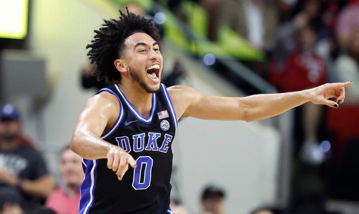 Duke’s Jared McCain (0) celebrates making a three-pointer during the second half of Duke’s 79-64 victory over N.C. State at PNC Arena in Raleigh, N.C., Monday, March 4, 2024.