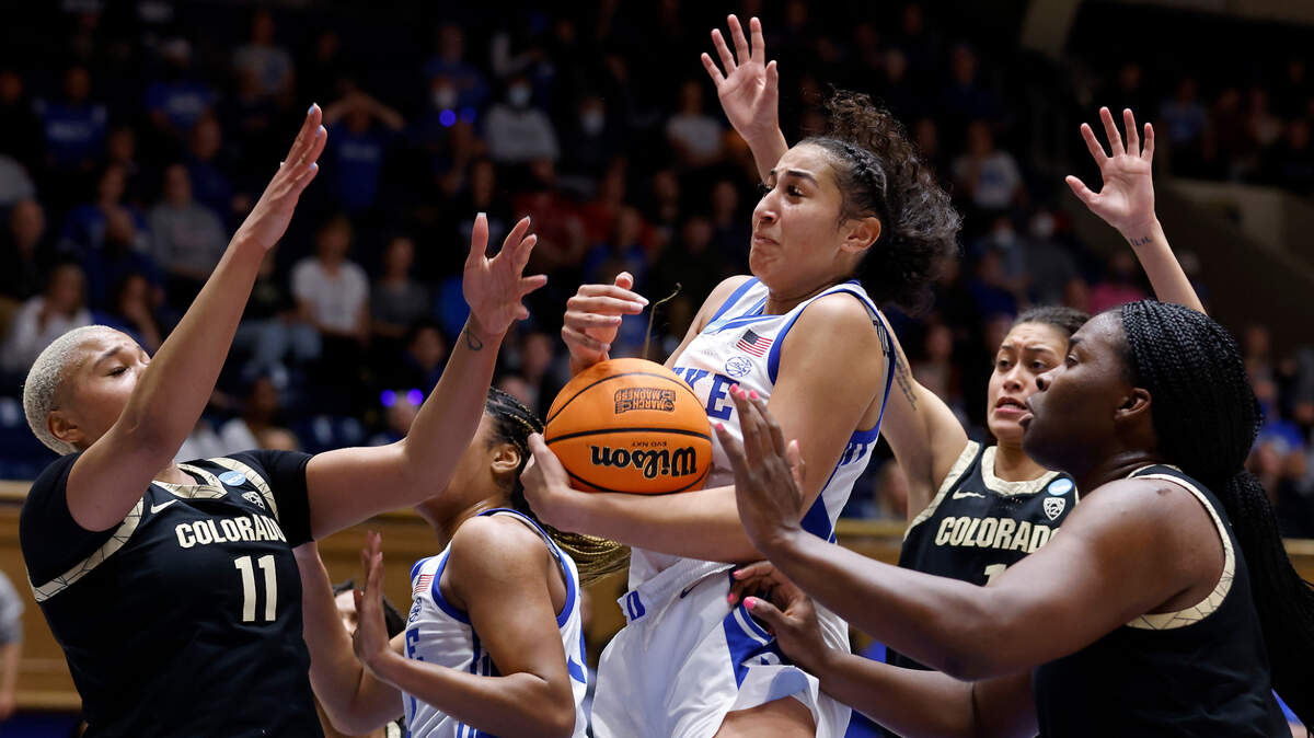 Duke’s Taya Corosdale, center, pulls down a rebound during the first half of the Blue Devils’ NCAA Tournament second round game against Colorado at Cameron Indoor Stadium on Monday, March 20, 2023, in Durham, N.C.