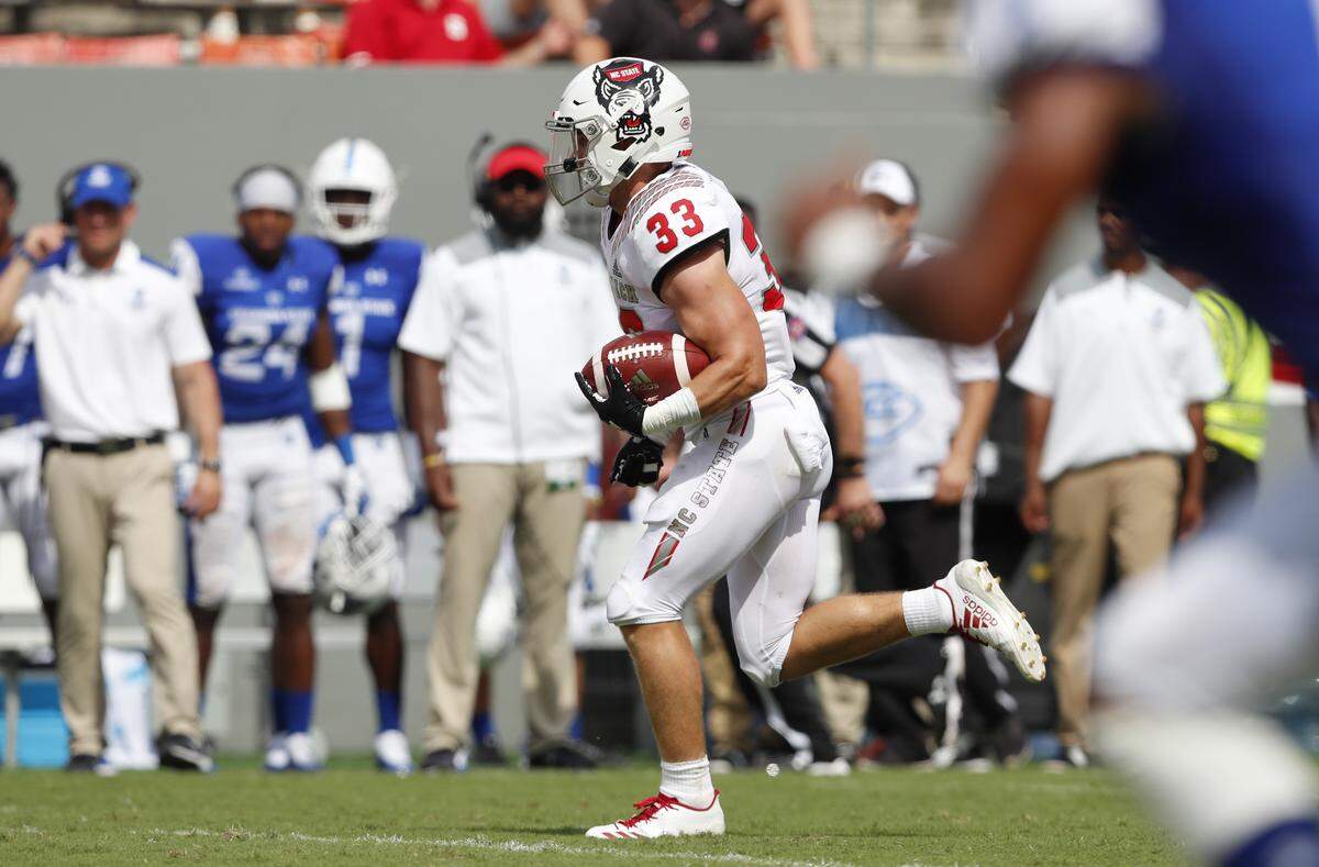 N.C. State’s Brady Bodine (33) runs for a 39-yard touchdown during the Wolfpack’s 41-7 victory over Georgia State at Carter-Finley Stadium in Raleigh, N.C., Saturday, Sept. 8, 2018.