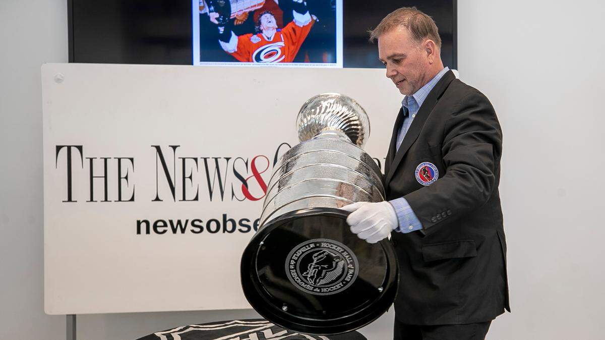Howie Borrow, the ‘Keeper of the Cup’, unloads The Stanley Cup during a stop at The News & Observer on Wednesday, May 10, 2023 in Raleigh, N.C.