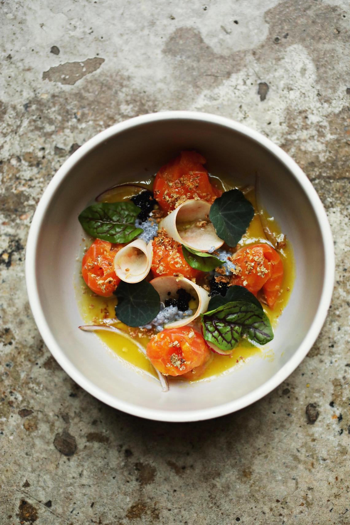 M Tempura serves a multisensory kaleidoscope of sea trout, honey crisp apple, fish roe and aji amarillo sauce as a starter for the M Omakase.