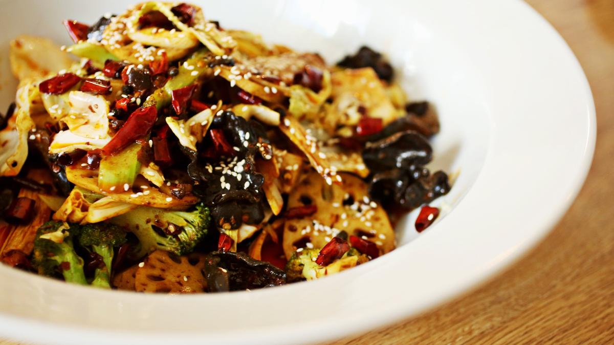 You’ll be given a separate sushi bar-style menu that allows you to choose from dozens of options that run the gamut for Chengdu 7’s dry pot, pictured here, or hot pot, a classic communal Sichuan dish.