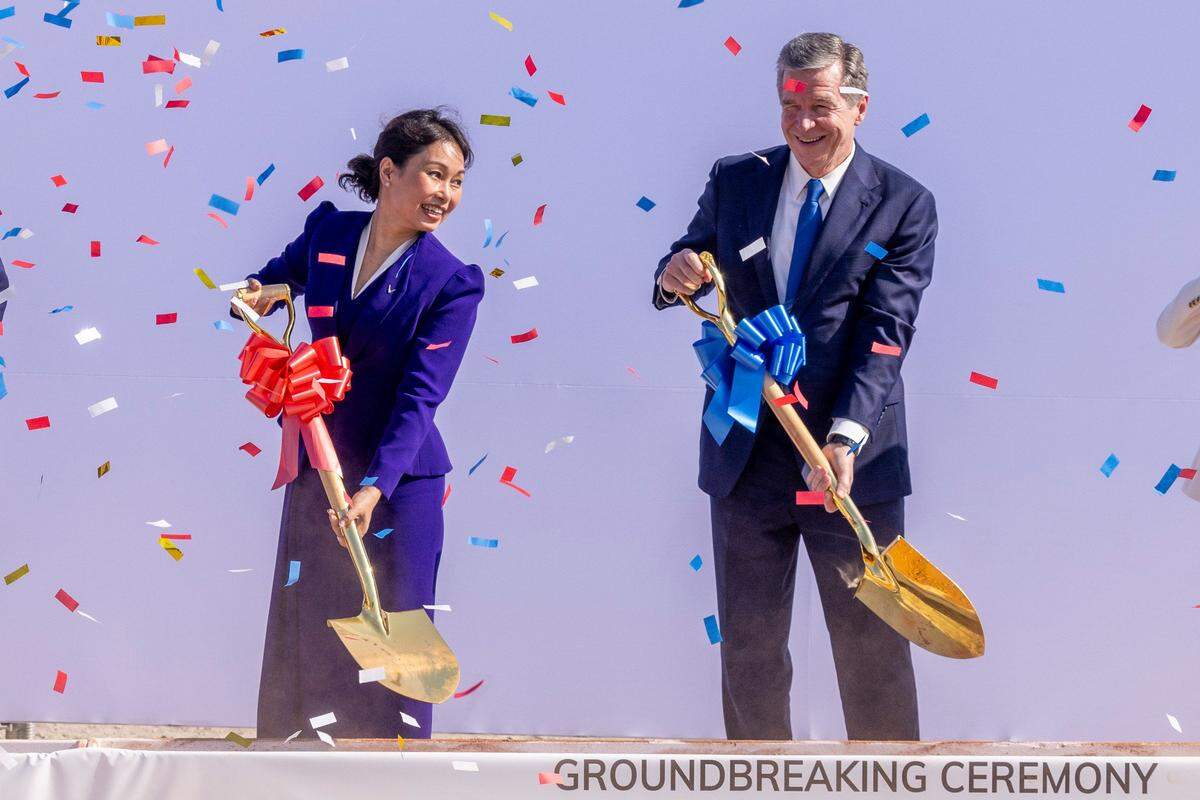 VinFast CEO Le Thi Thu Thuy and Gov. Roy Cooper participate in a a groundbreaking ceremony Friday, July 28, 2023 at the promised site of a VinFast plant in Moncure.