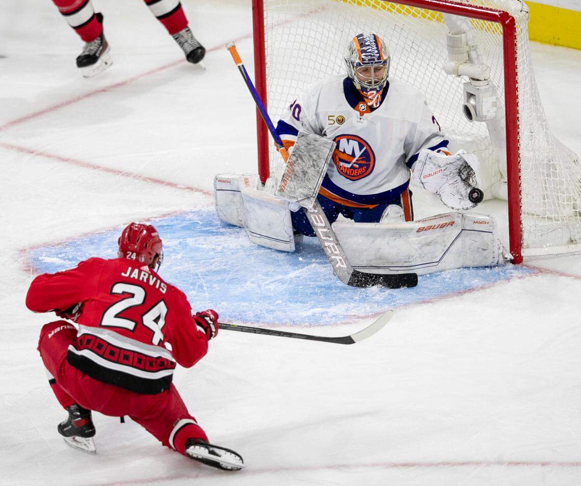 New York Islanders goalie Ilya Sorokin (30) stops a shot by the Carolina Hurricanes Seth Jarvis (24) in the second period during Game 5 of their Stanley Cup series on Tuesday, April 25, 2023 at PNC Arena in Raleigh, N.C.