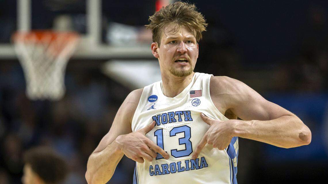 North Carolina center Henri Veesaar (13) reacts after sinking a three-point basket to give the Tar Heels a lead over VCU in the first half on Thursday, March 18, 2026, during the first round of the NCAA Tournament at Bon Secours Arena in Greenville, S.C.