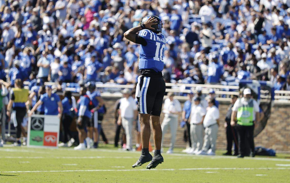 Duke quarterback Darian Mensah (10) reacts after watching Georgia Tech defensive back Omar Daniels (9) return a fumble for a touchdown during the first half of Duke’s game against Georgia Tech at Wallace Wade Stadium in Durham, N.C., Saturday, Oct. 18, 2025.
