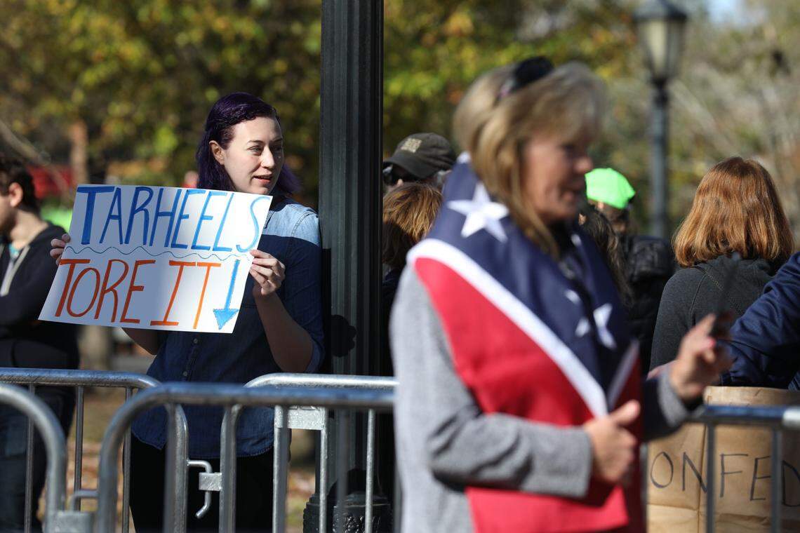 Members of Heirs to the Confederacy gathered at the empty base of the Silent Sam statue in Chapel Hill on Sunday for a prayer service. They were met by protesters.