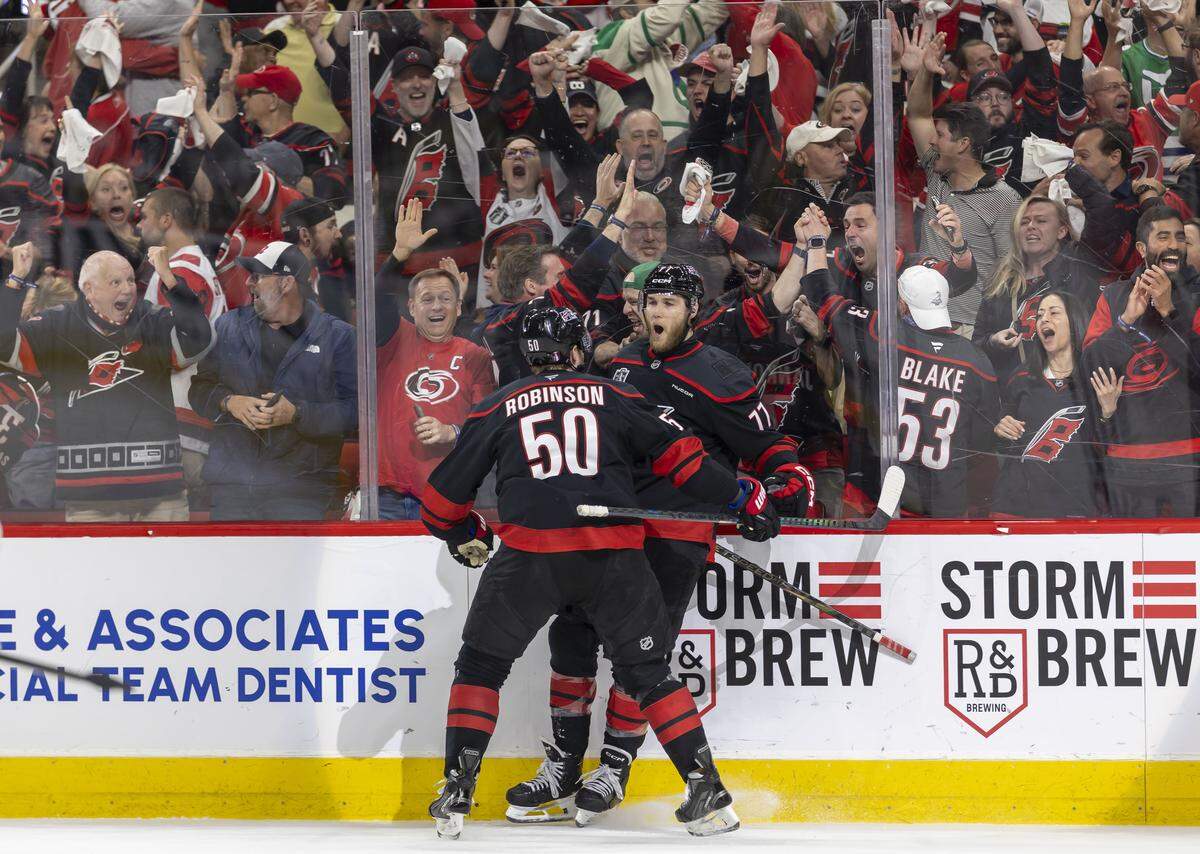 Carolina Hurricanes left wing Mark Jankowski (77) celebrates after scoring in the third period to tie Vegas 2-2 in Game 2 of the Stanley Cup Final, on Thursday, June 4, 2026 at Lenovo Center in Raleigh, N.C. 