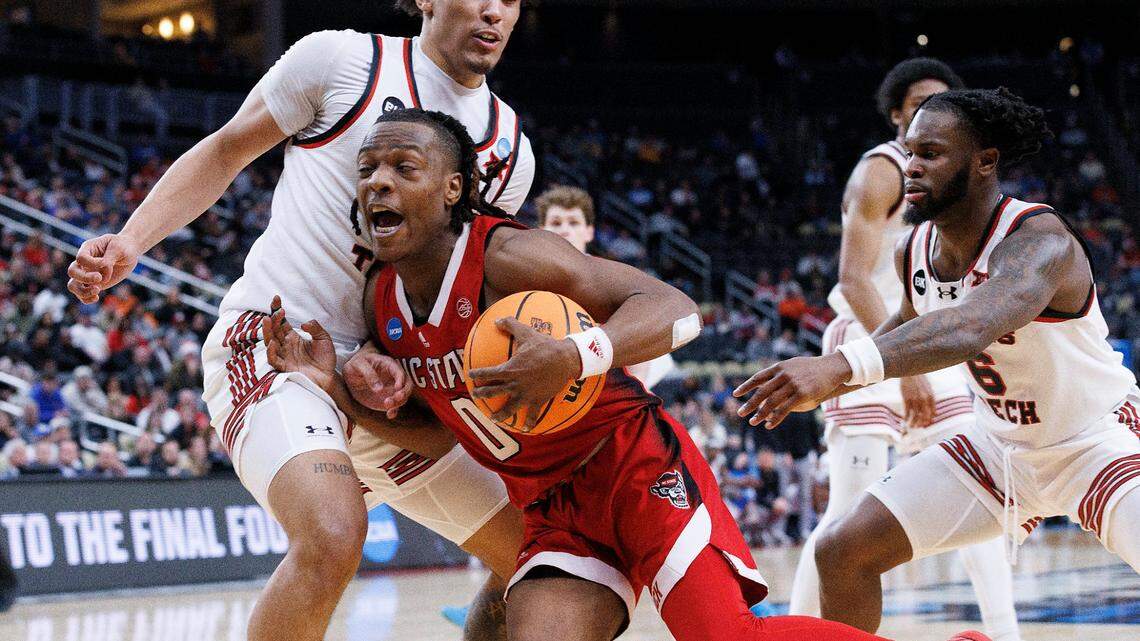 N.C. State’s DJ Horne drives against Texas Tech’s Darrion Williams during the second half of the Wolfpack’s 80-67 win in first round of the NCAA Tournament on Thursday, March 21, 2024, at PPG Paints Arena in Pittsburgh, Pa.