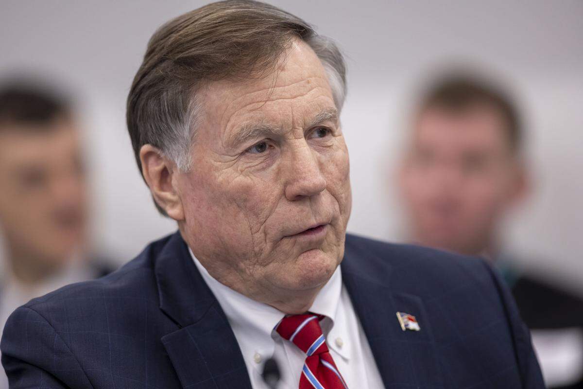 North Carolina Commissioner of Insurance Mike Causey presents a report from his department during the Council of State meeting on Feb. 4, 2025, in Raleigh, N.C.