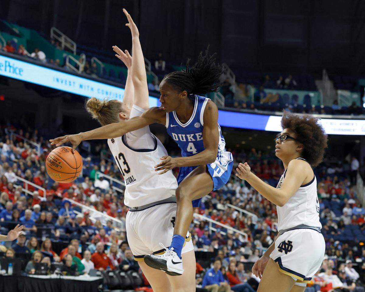 Duke’s Jadyn Donovan looks to pass around Notre Dame’s Kate Koval during the first half of the Blue Devils’ ACC Tournament semifinal game on Saturday, March 8, 2025, at First Horizon Coliseum in Greensboro, N.C.