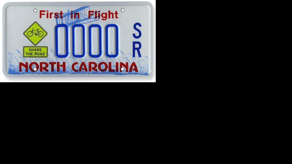 Many North Carolina license plates feature the slogan "First in Flight" with a silhouette of the Wright Brothers plane.