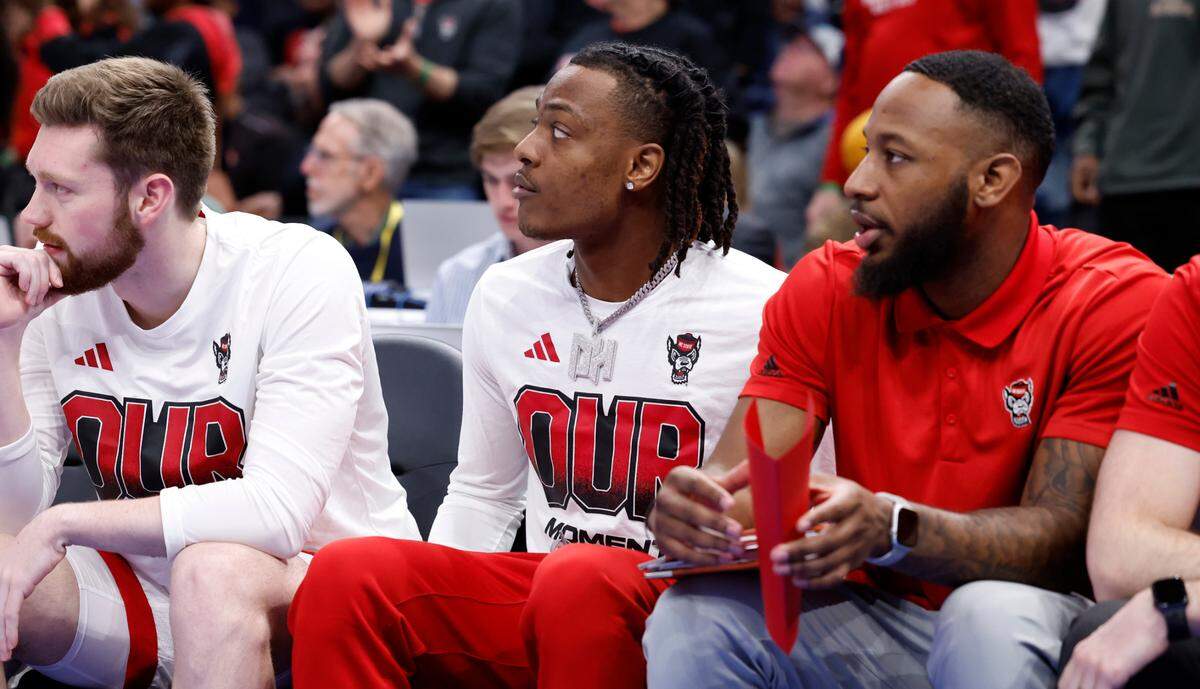 N.C. State’s DJ Horne, center, watches during the second half of N.C. State’s 94-85 victory over Louisville in the first round of the 2024 ACC Men’s Basketball Tournament at Capital One Arena in Washington, D.C., Tuesday, March 12, 2024.