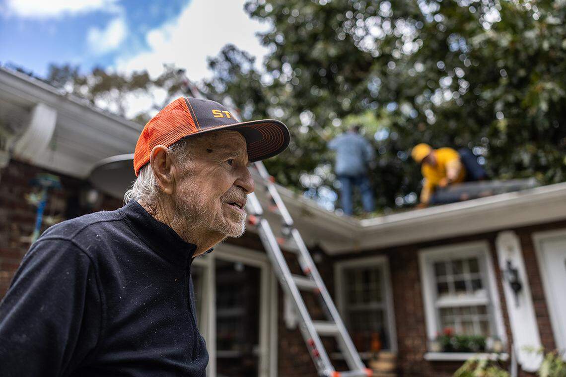 Bill White watches as a crew with NC Baptists on Mission Disaster Relief work to remove trees from his home in Arden, N.C. on Monday, September 30, 2024.