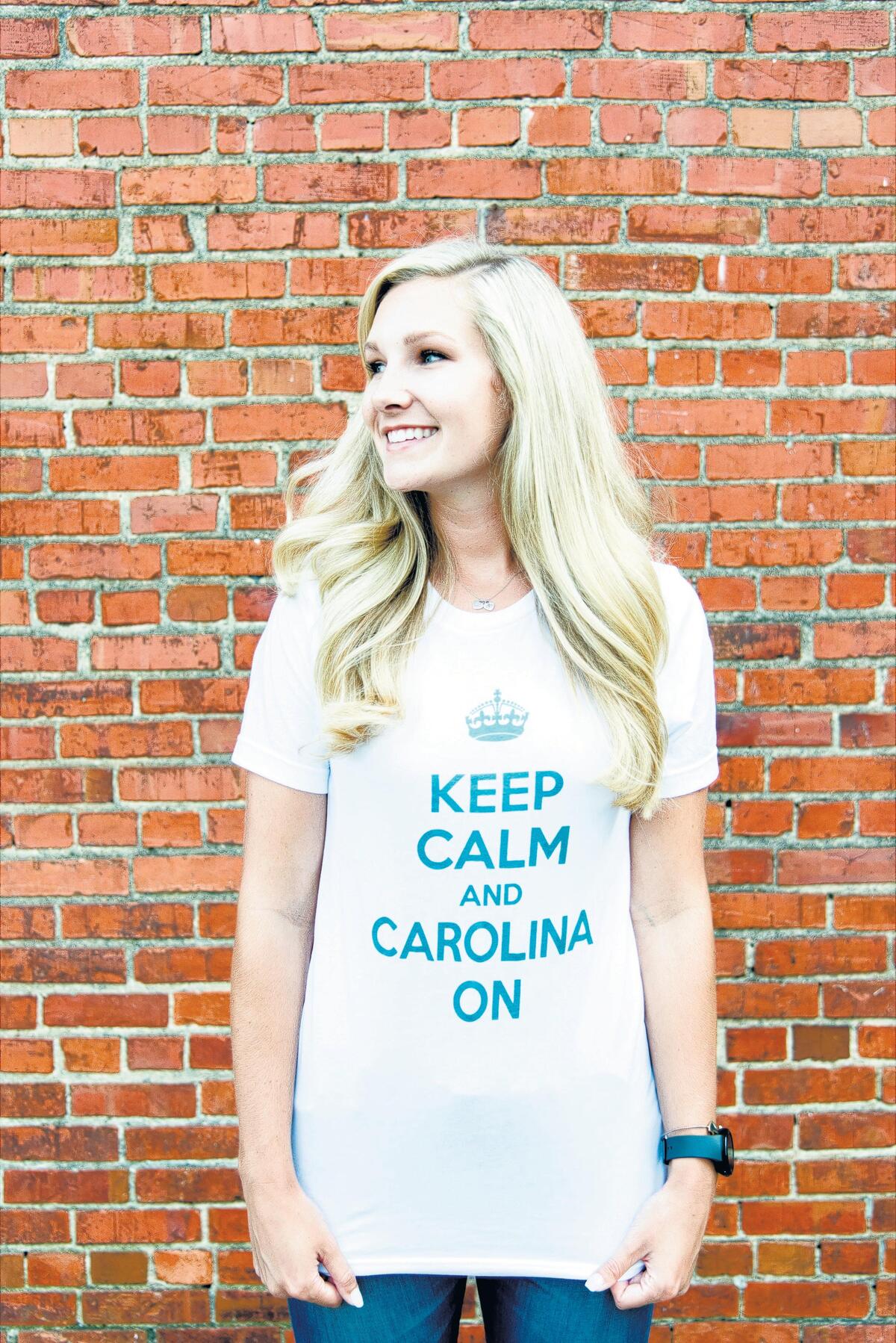 Louise Alfredson launched a T-shirt line, Keep Calm and Carolina On. The shirts are emblazoned with the slogan and a choice of crown or North Carolina map.