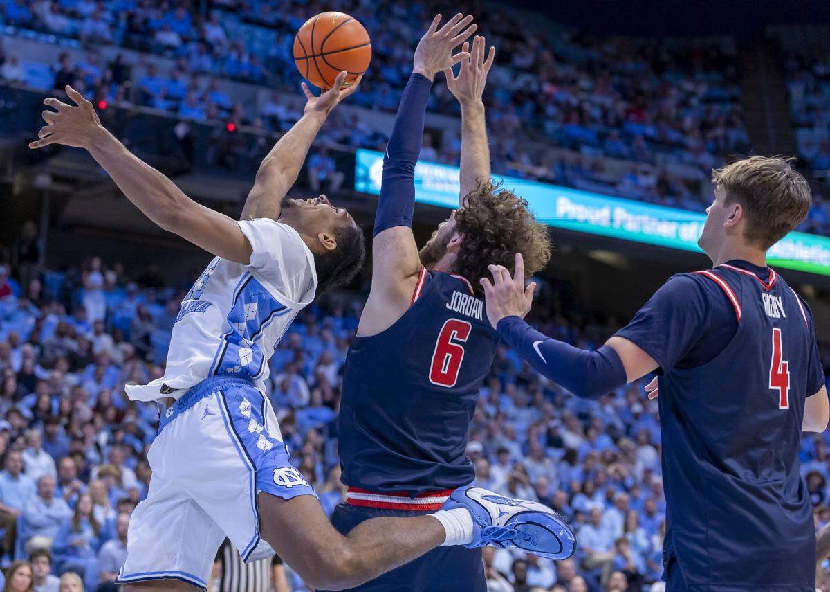 North Carolina forward Jarin Stevenson (15) works for an offensive rebound against Radford forward Louie Jordan (6) in the first half on Tuesday, November 11, 2025 at the Smith Center in Chapel Hill, N.C.