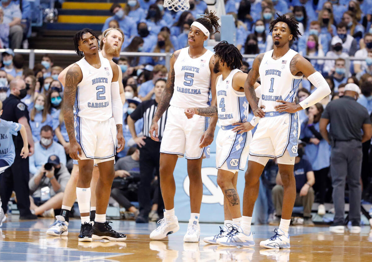 From left, North Carolina’s Caleb Love (2), Brady Manek (45), Armando Bacot (5), R.J. Davis (4) and Leaky Black (1) wait for play to start after a timeout during the first half of UNC’s game against Pitt at the Smith Center in Chapel Hill, N.C., Wednesday, Feb. 16, 2022.