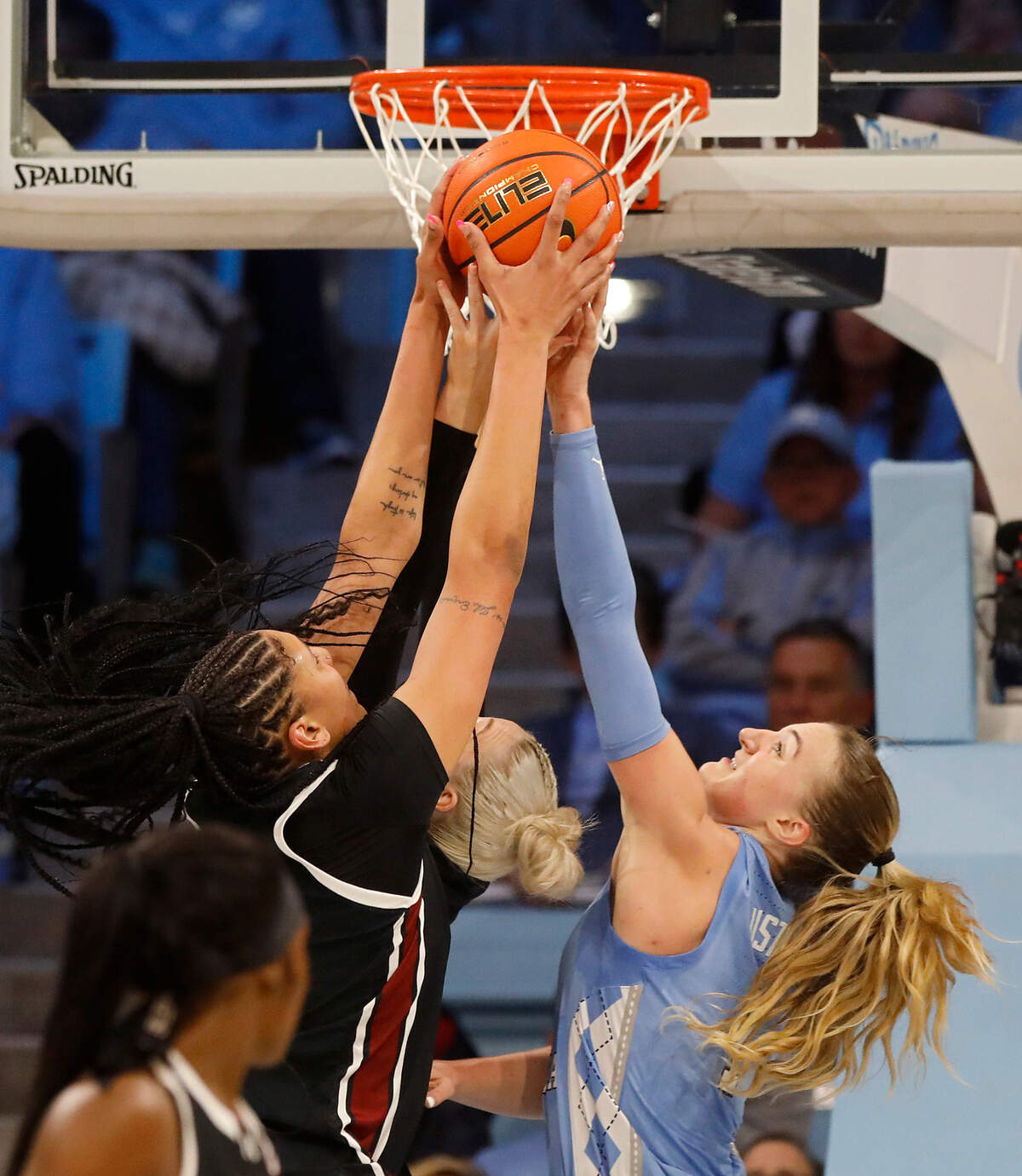 South Carolina’s Kamilla Cardoso pulls a rebound down away from North Carolina’s Alyssa Ustby during the second half of the Tar Heels’ 65-58 loss on Thursday, Nov. 30, 2023, at Carmichael Arena in Chapel Hill, N.C.
