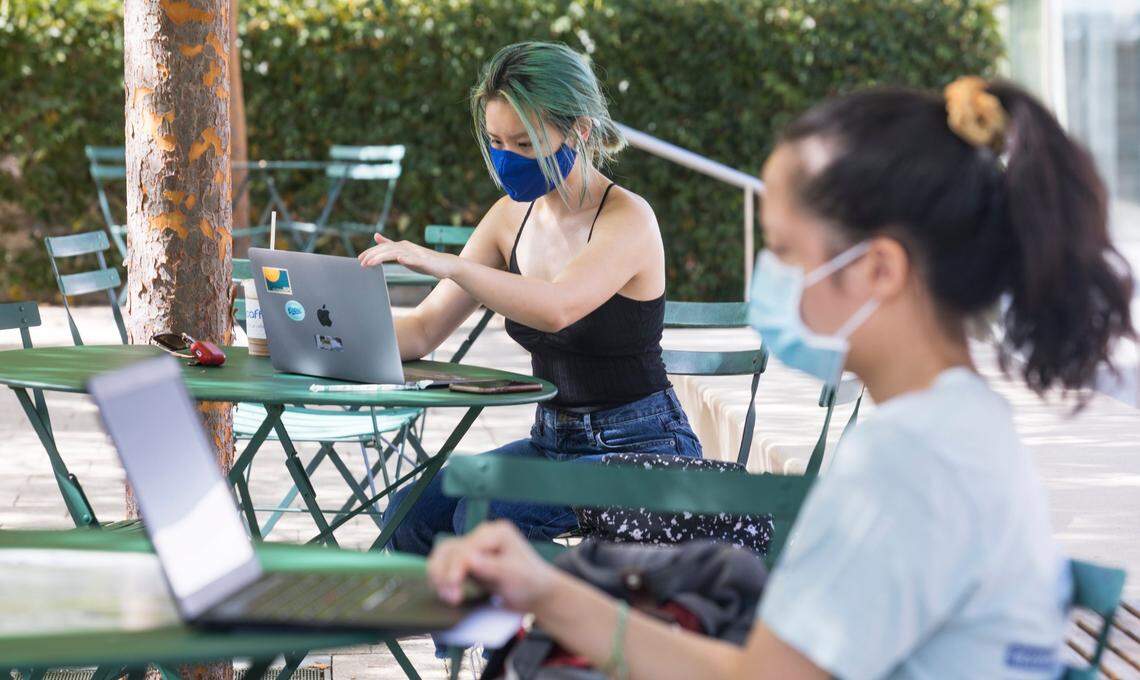 Duke University students Annie Do, middle, a junior, and Cynthia Wang, right, a senior, study on Duke’s west campus in Durham, N.C. on Tuesday, Aug. 31, 2021.