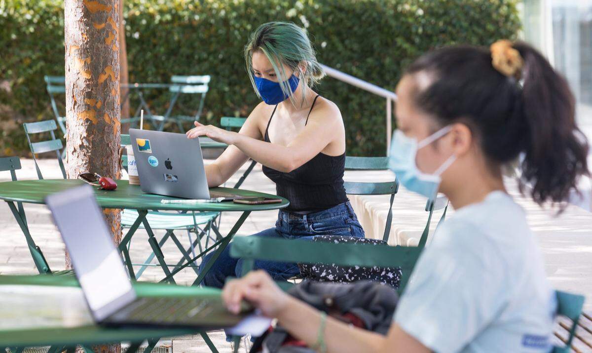 Duke University students Annie Do, middle, a junior, and Cynthia Wang, right, a senior, study on Duke’s west campus in Durham, N.C. on Tuesday, Aug. 31, 2021.