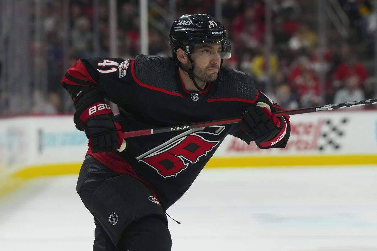 Mar 5, 2023; Raleigh, North Carolina, USA; Carolina Hurricanes defenseman Shayne Gostisbehere (41) skates against the Tampa Bay Lightning during the first period at PNC Arena. Mandatory Credit: James Guillory-USA TODAY Sports
