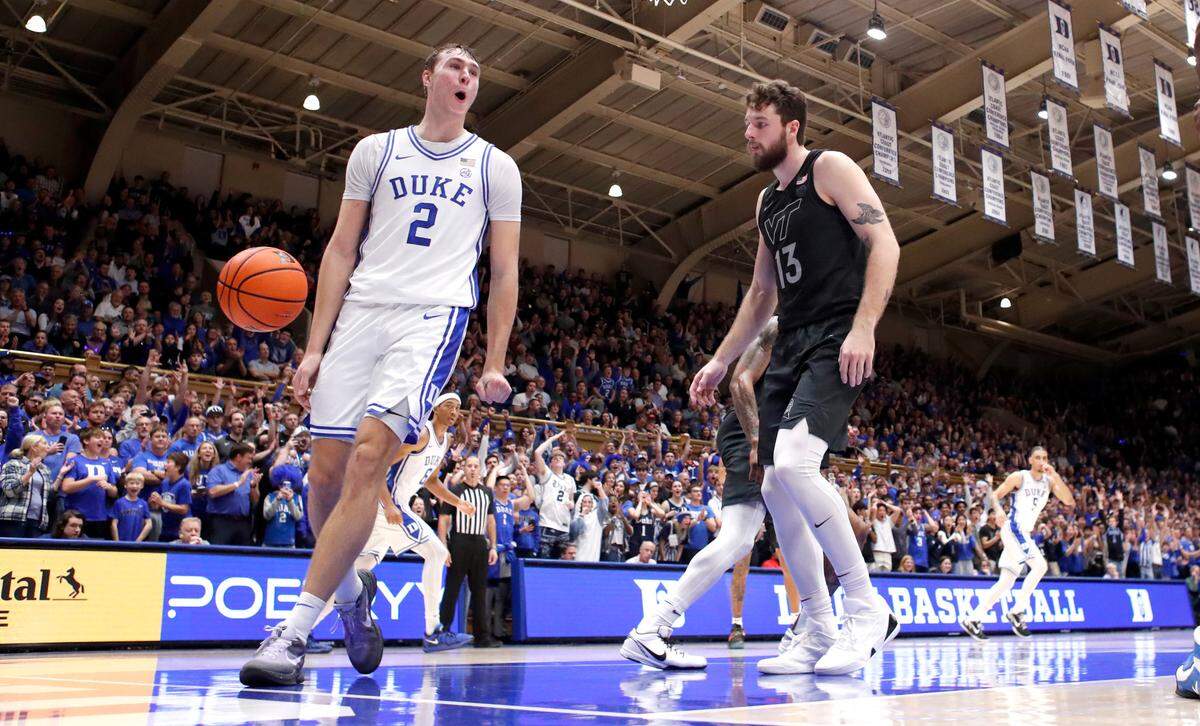 Duke’s Cooper Flagg (2) celebrates after slamming in two on an alley-oop during Duke’s 88-65 victory over Virginia Tech at Cameron Indoor Stadium in Durham, N.C., Tuesday, Dec. 31, 2024.