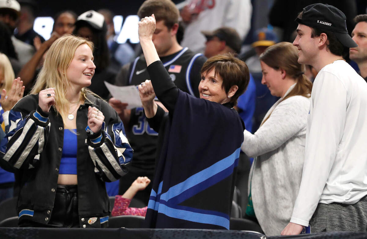 Mickie Krzyzewski dances during the second half of Duke’s 78-69 victory over Arkansas in the NCAA Tournament West Regional finals at the Chase Center in San Francisco, Calif., Saturday, March 26, 2022.