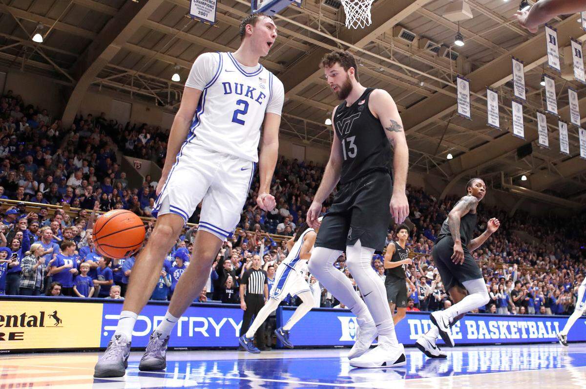 Duke’s Cooper Flagg (2) celebrates after slamming in two on an alley-oop during Duke’s 88-65 victory over Virginia Tech at Cameron Indoor Stadium in Durham, N.C., Tuesday, Dec. 31, 2024.