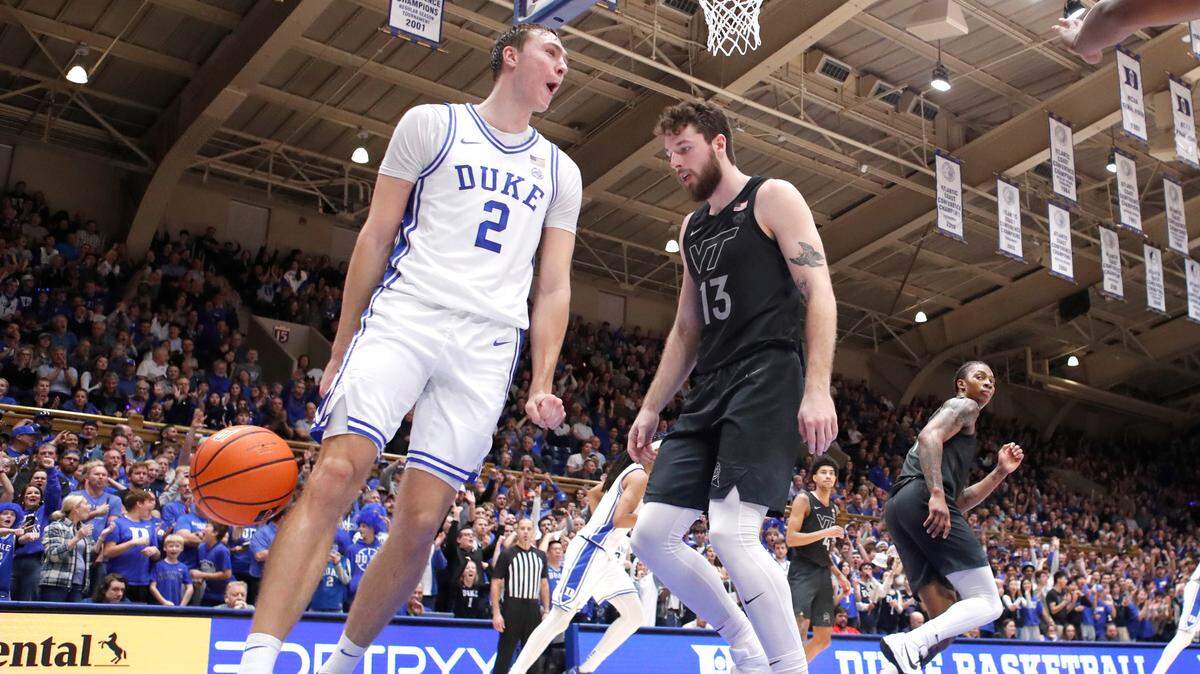 Duke’s Cooper Flagg (2) celebrates after slamming in two on an alley-oop during Duke’s 88-65 victory over Virginia Tech at Cameron Indoor Stadium in Durham, N.C., Tuesday, Dec. 31, 2024.