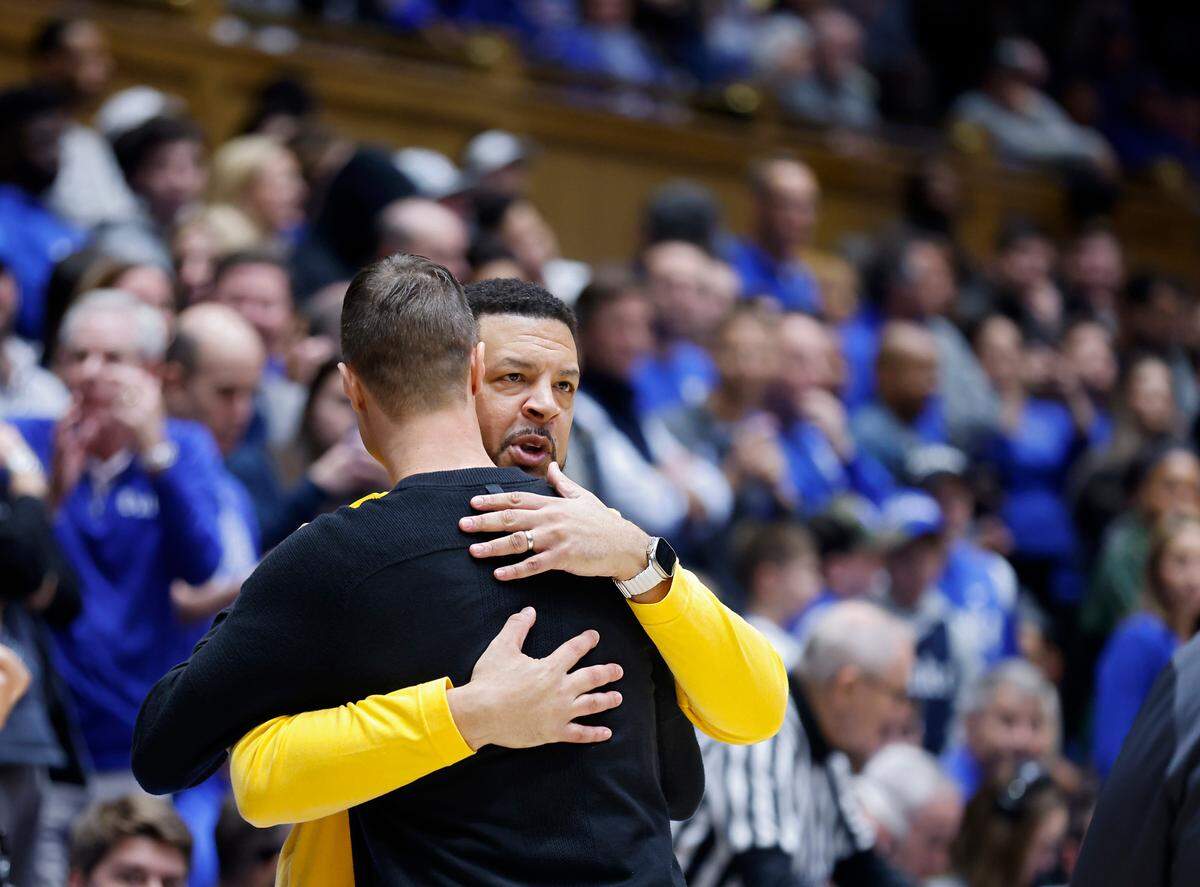 Pittsburgh head coach Jeff Capel greets Duke head coach Jon Scheyer prior to the Blue Devils’ game against Pitt at Cameron Indoor Stadium on Wednesday, Jan. 11, 2023, in Durham, N.C.