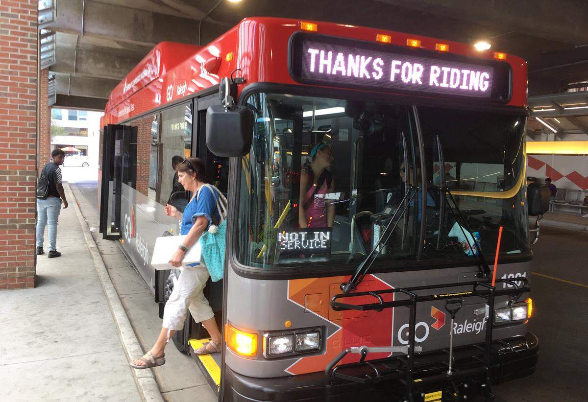 One of GoRaleigh's new compressed natural gas buses at the main bus station at Moore Square downtown. The buses look similar to the diesel buses they are replacing, except for the compartment on the roof where the CNG fuel tanks are kept.