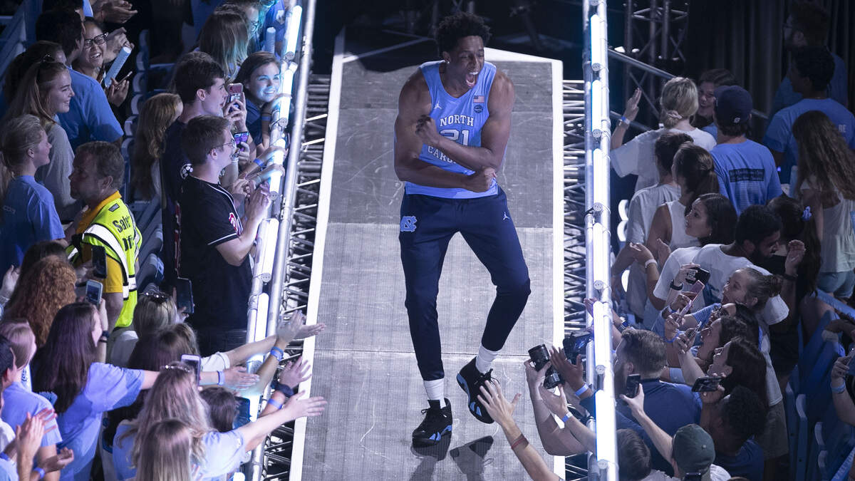 North Carolina’s Sterling Manley (21) is introduced to the crowd during the annual Late Night With Roy Williams kickoff to the basketball season on Friday, September 27, 2019 at the Smith Center in Chapel Hill, N.C.