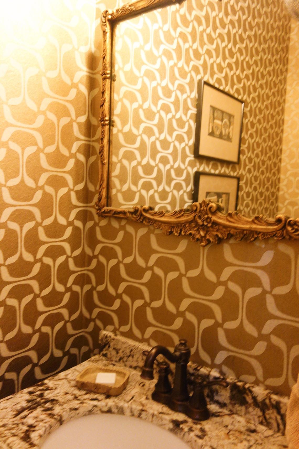 A good rule when selecting wallpaper for the powder room make it fun. It’s your public restroom. This paper is by Thibaut and has a bold and vivid tribal feel.