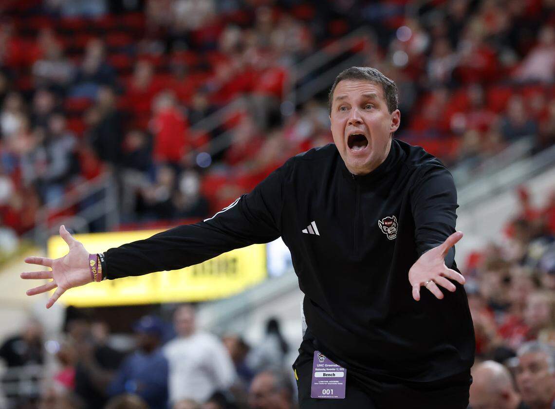 N.C. State head coach Will Wade speaks with an official during the second half of the Wolfpack’s 110-64 win over UNC Greensboro on Wednesday, Nov. 12, 2025, at Lenovo Center in Raleigh, N.C.
