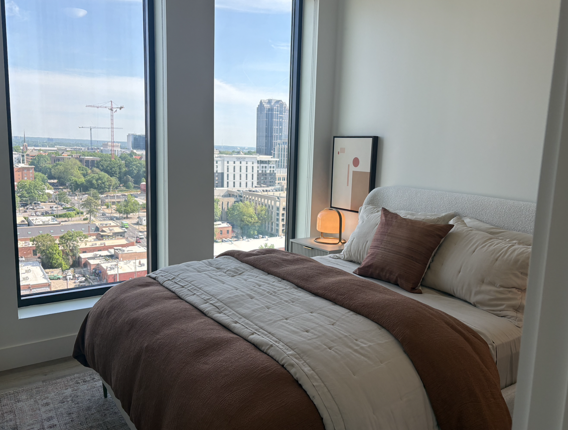 A bedroom inside Maeve, which is now open across the street from Red Hat Amphitheater.