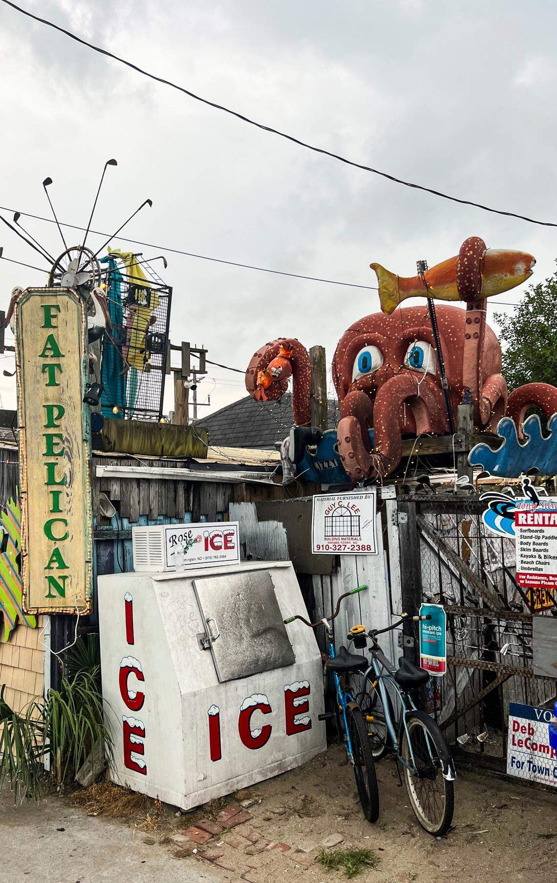 The Fat Pelican is a quirky bar in Carolina Beach featuring a self-serve beer cooler.
