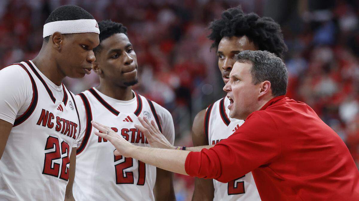 N.C. State head coach Will Wade talks with his team late in the second half of the Wolfpack’s 82-58 win over North Carolina on Tuesday, Feb. 17, 2026, at Lenovo Center in Raleigh, N.C.