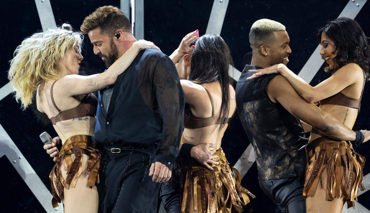 Ricky Martin and his dancers perform on “The Trilogy Tour” at Raleigh, N.C.’s PNC Arena, Thursday night, Feb. 29, 2024.