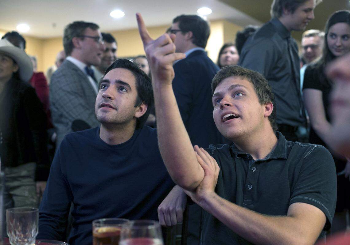 Conner Paszko, left and  Nicholas Slipchenko watch the early returns at the North Carolina Republican Party election night gathering on Tuesday, November 6, 2018 at the DoubleTree Hotel in Raleigh, NC.