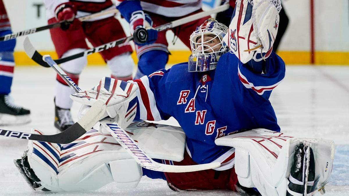 New York Rangers goaltender Igor Shesterkin (31) makes a save in the first period of Game 4 of an NHL hockey Stanley Cup second-round playoff series, Tuesday, May 24, 2022, in New York.