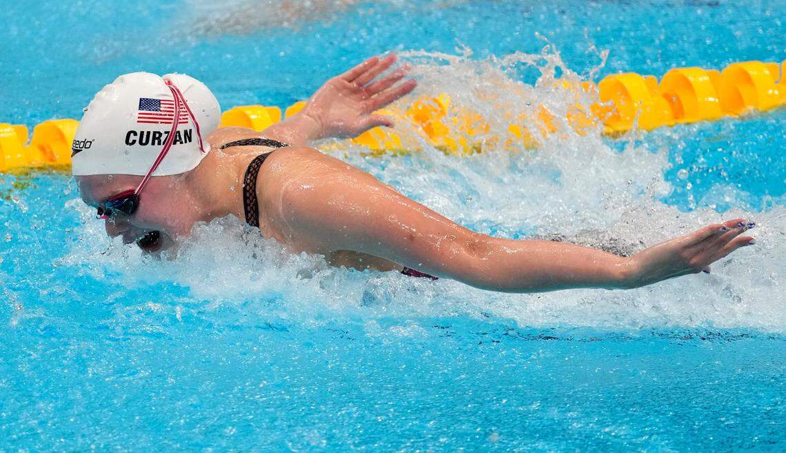 Claire Curzan swims in a heat for the women’s 100-meter butterfly at the 2020 Summer Olympics, Saturday, July 24, 2021, in Tokyo, Japan. It was Curzan’s first Olympics and she came back with a silver medal as a member of the U.S. 4x100-meter medley relay team.