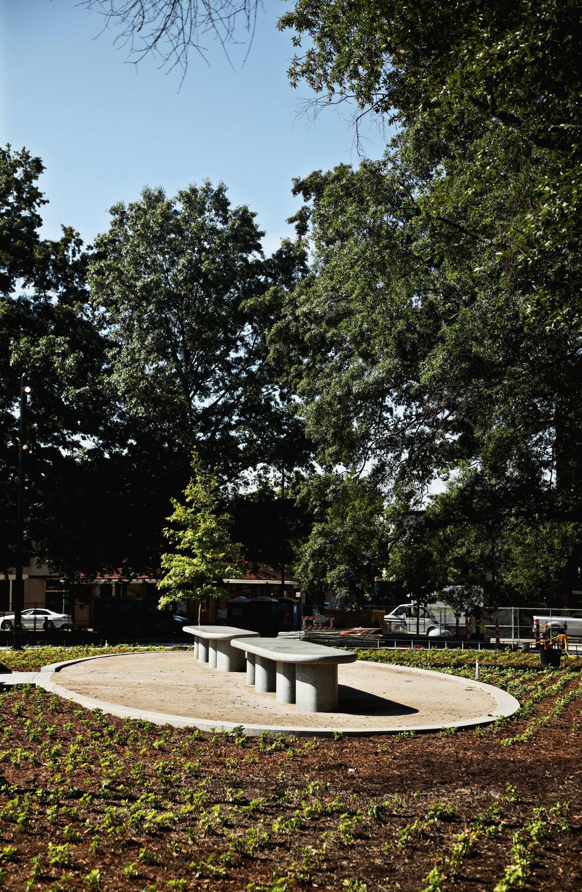 Dallas landscape artist Brad Goldberg created two large community tables for large gatherings, wedding parties and family reunions and accommodating up to 50 people in the southwest corner of Moore Square.