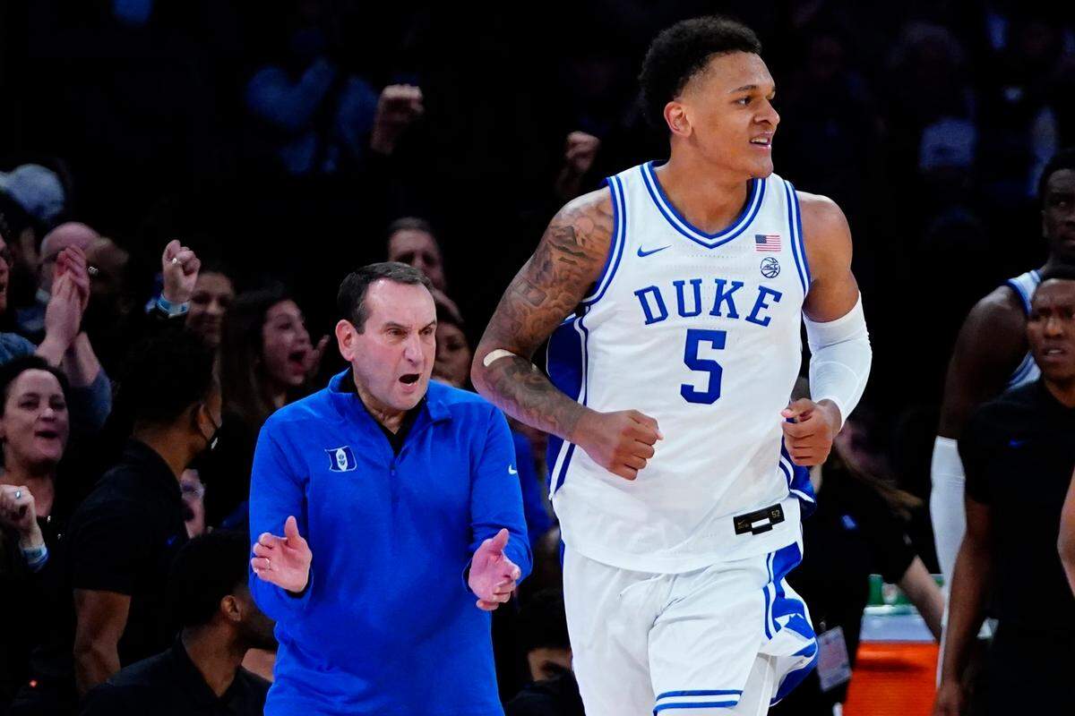 Duke head coach Mike Krzyzewski reacts after Duke’s Paolo Banchero (5) scored during the second half of an NCAA college basketball game against Kentucky Tuesday, Nov. 9, 2021, in New York. Duke won 79-71. (AP Photo/Frank Franklin II)